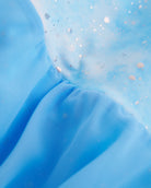 Close-up of Cloudburst Blue ballet dress showing the shimmering butterfly print and soft gathered lavender skirt fabric.