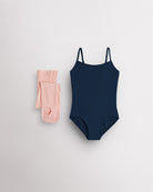 Navy girls camisole leotard with pink convertible dance tights laid flat for ballet and dance class.