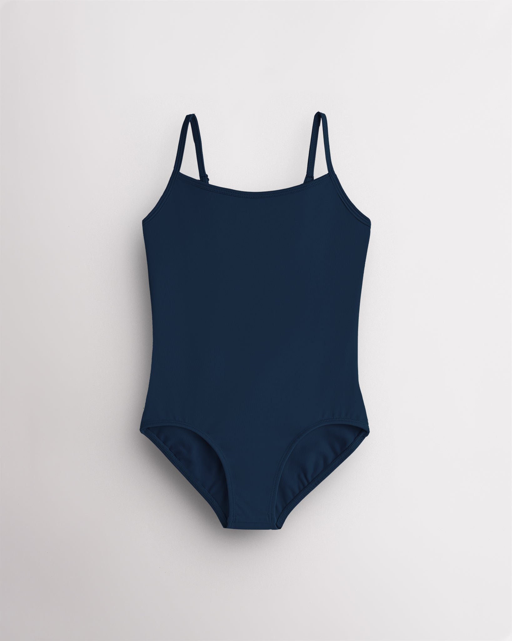 Navy girls camisole leotard with adjustable spaghetti straps, front lining, and smooth performance fabric.