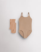 Nude camisole leotard for girls with tan convertible tights laid flat for ballet, dance, and costume layering.