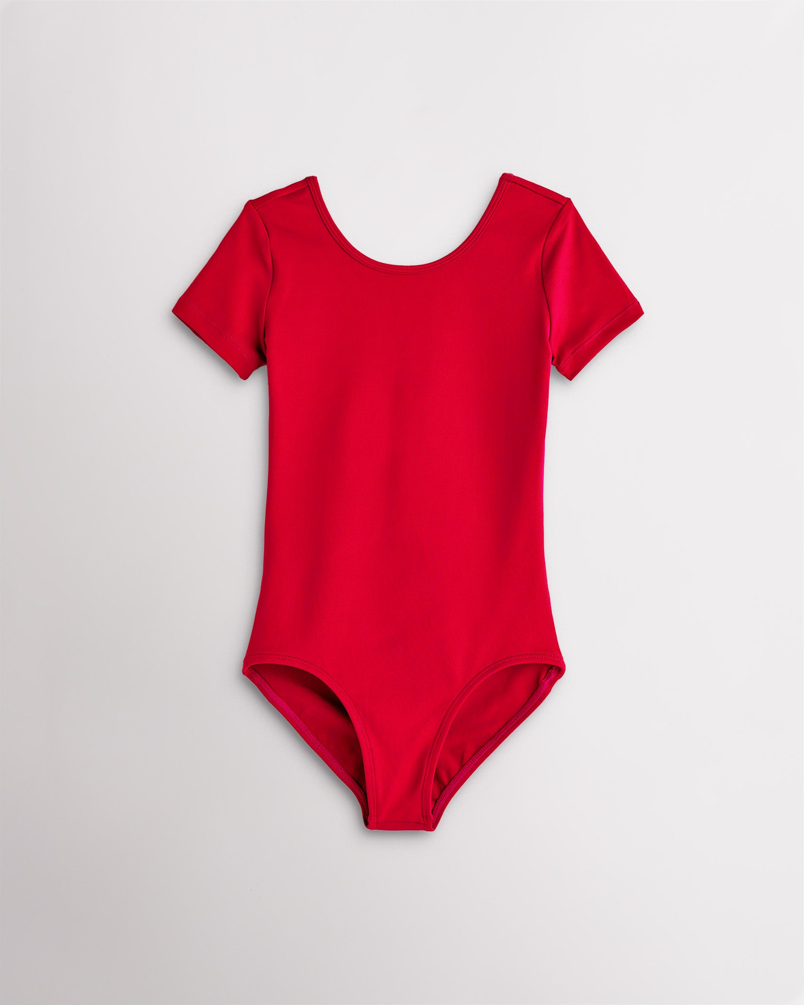 Girls cherry short sleeve leotard with scoop neckline and fitted stretch design for dance and ballet.