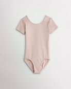 Girls nude short sleeve leotard with scoop neckline and fitted stretch design for dance and ballet.