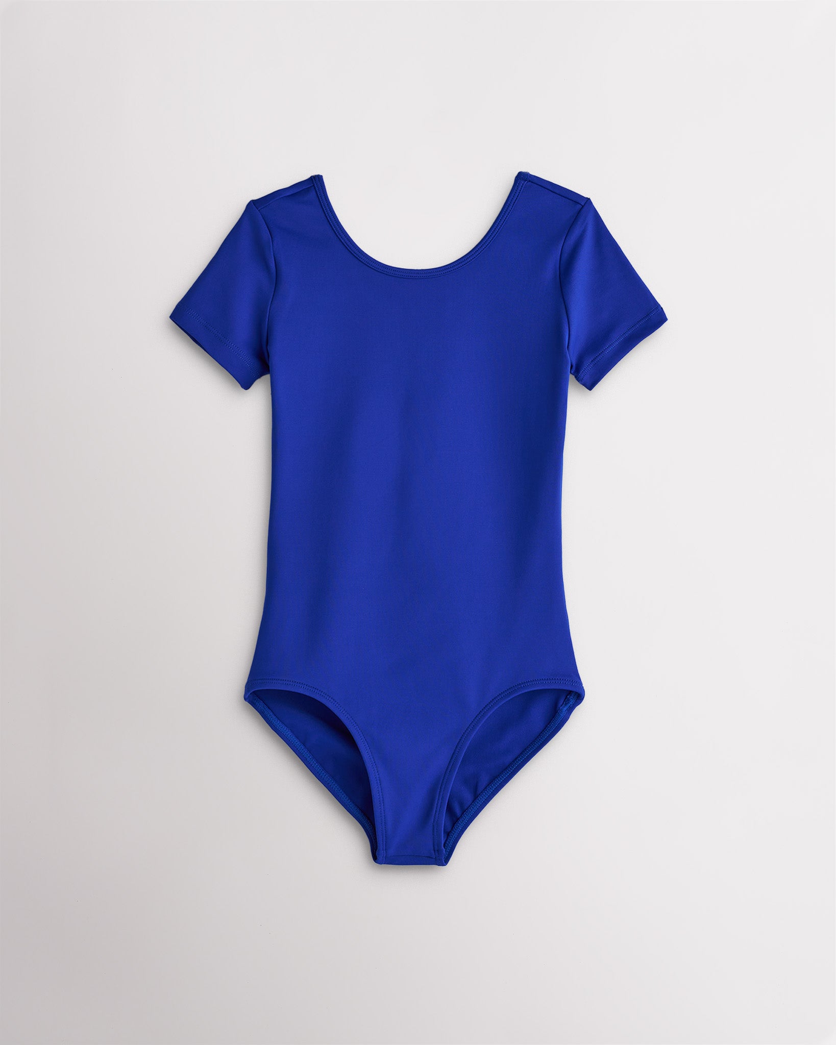 Girls royal blue short sleeve leotard with scoop neckline and fitted stretch design for dance and ballet.