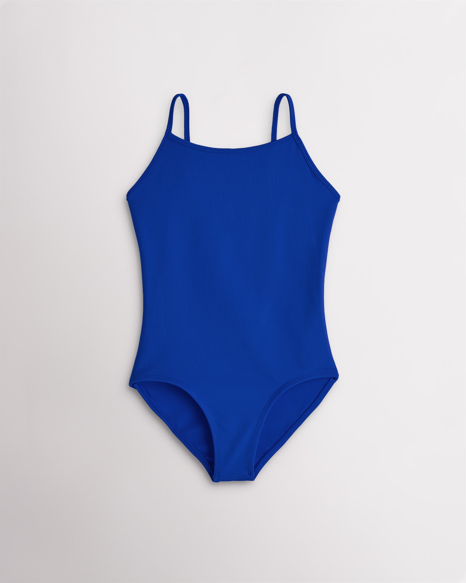 Girls royal blue camisole leotard with adjustable straps and smooth stretch fabric for ballet and gymnastics.