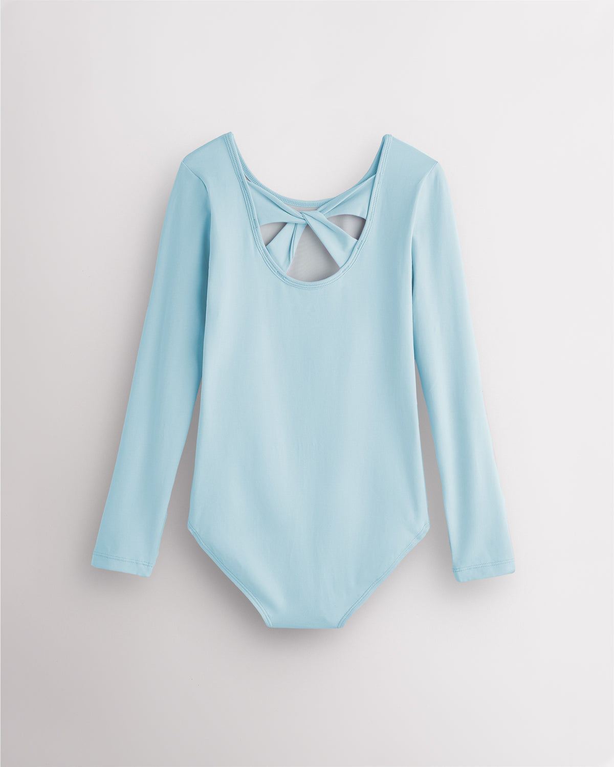 Back view of blue long sleeve leotard for girls with twist-back bow detail and soft cotton fabric.