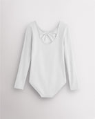 Back view of white long sleeve leotard for girls with twist-back bow detail and soft cotton fabric.