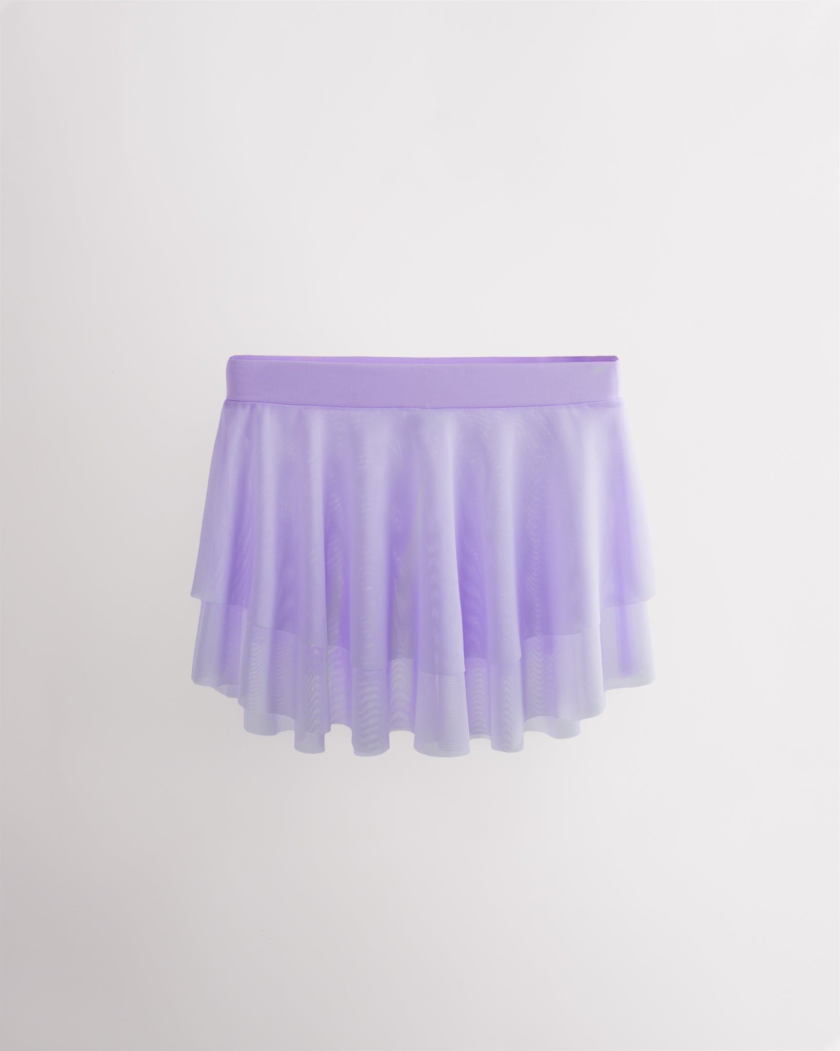 Lavender girls ballet mesh tiered skirt with double-layer mesh, elastic waistband, and curved hem for a flowy silhouette.