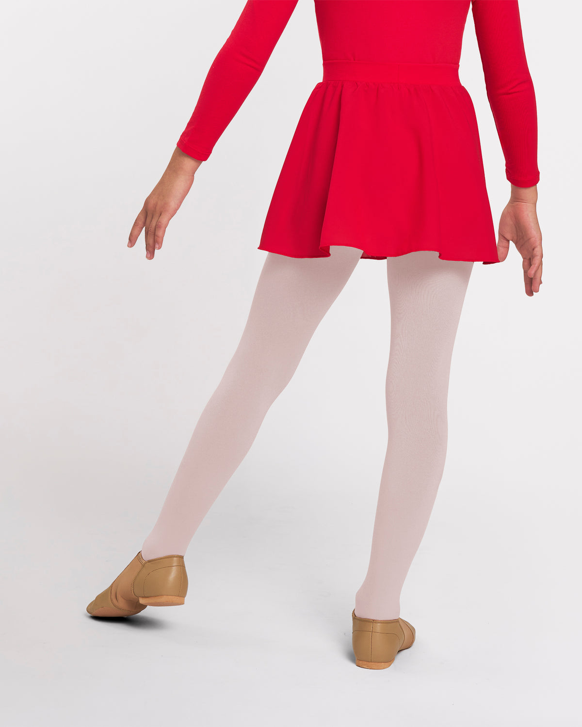 Front view of girl wearing a red pull-on chiffon skirt with white tights and tan ballet shoes.