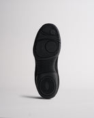 Bottom sole of kids cheer shoes showing traction pattern for grip and stability