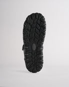 High-traction rubber outsole on kids sandal designed for grip and durability