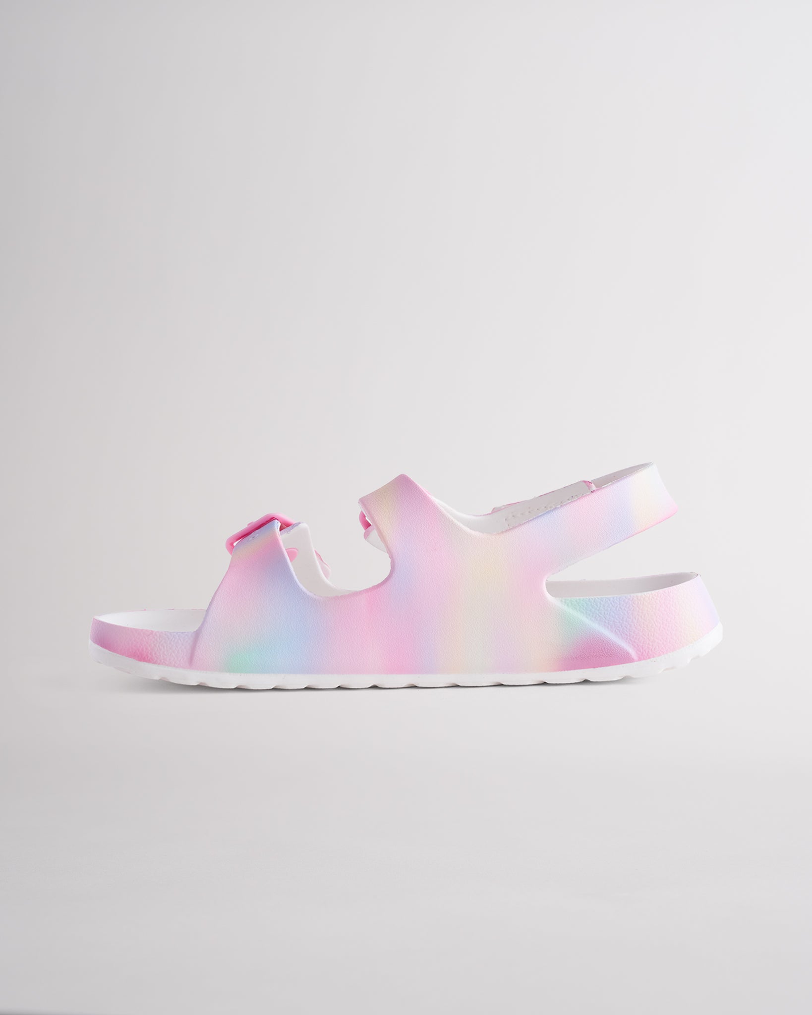 Colorful sandals for kids featuring contoured footbed, flexible design, and secure back strap