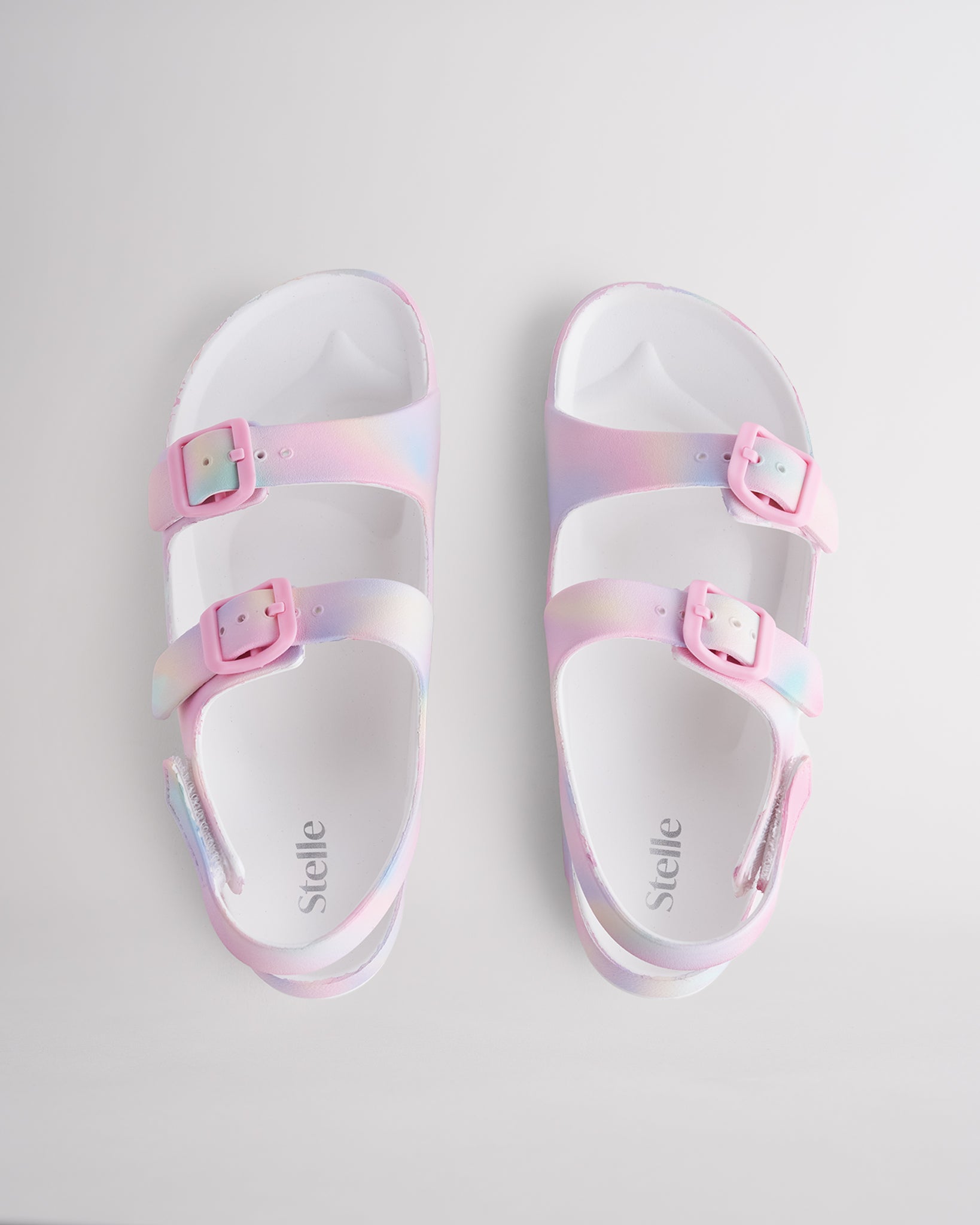Top view of Rainbow kids sandals with dual adjustable buckles, contoured footbed, and soft lightweight material