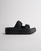 Black Stelle Kids StelleCloud Buckled Slide with adjustable buckle straps, contoured footbed, and supportive casual design.