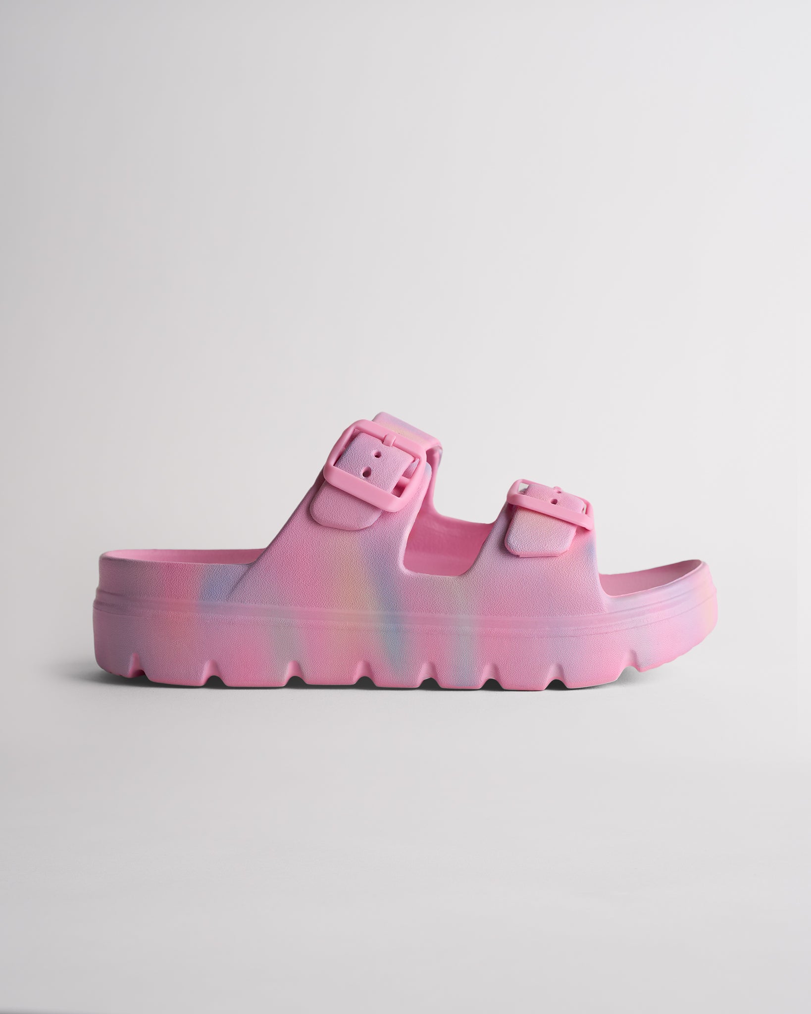 Cotton Candy Ombre Stelle Kids StelleCloud Buckled Slide with adjustable buckle straps, contoured footbed, and supportive casual design.
