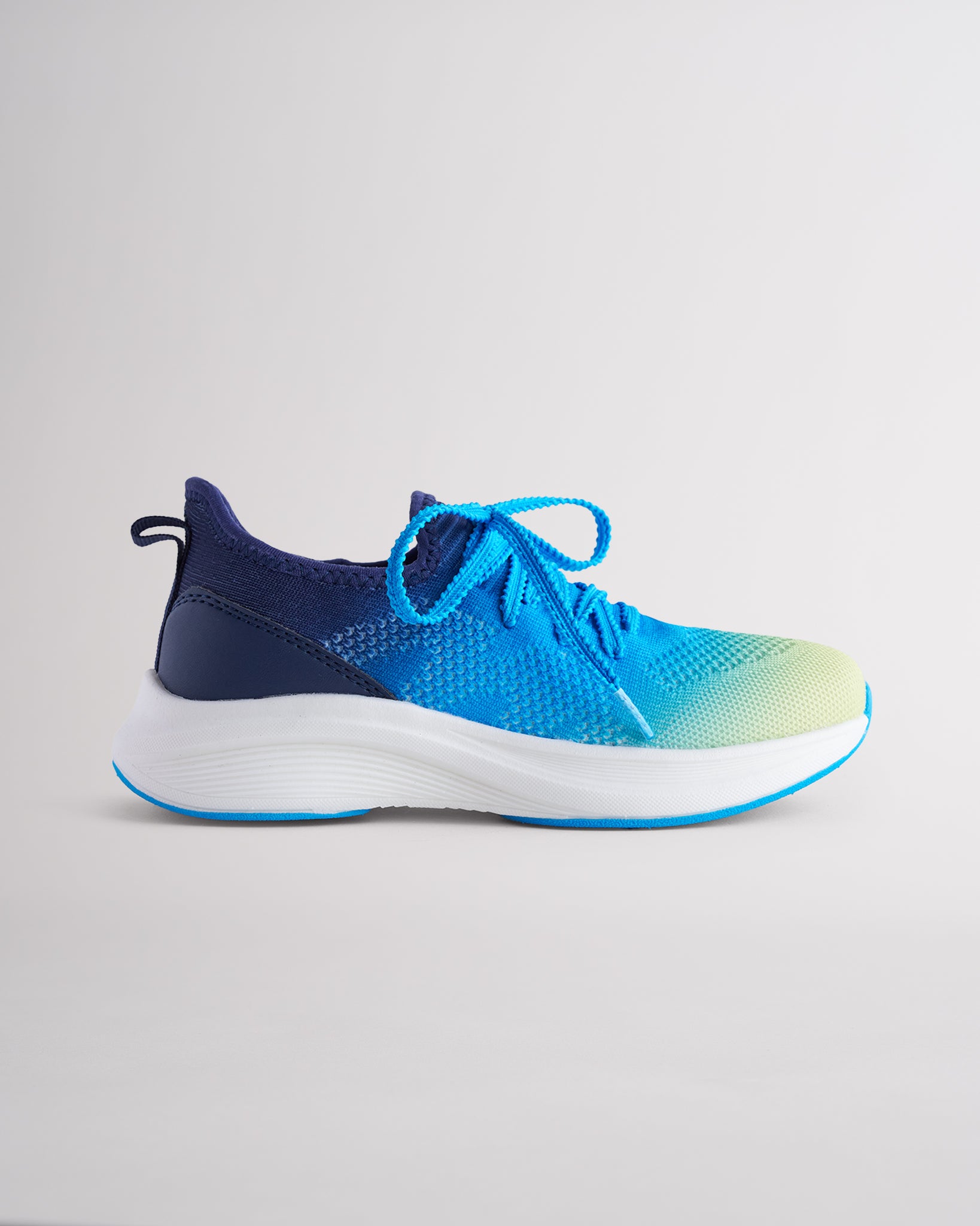 Kids Lume Lagoon lace-up running sneakers with cushioned white sole.
