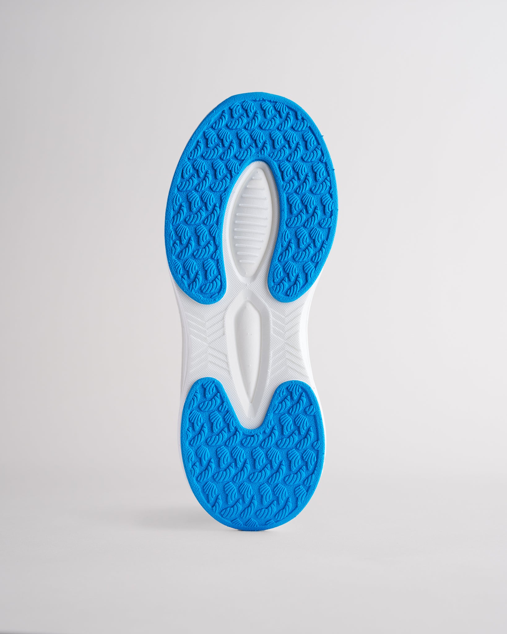 Kids Lume Lagoon lace-up running sneakers with cushioned white sole.