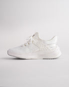 kids running shoes in white