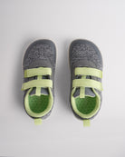 Top view of grey kids barefoot shoes showing dual straps and breathable interior