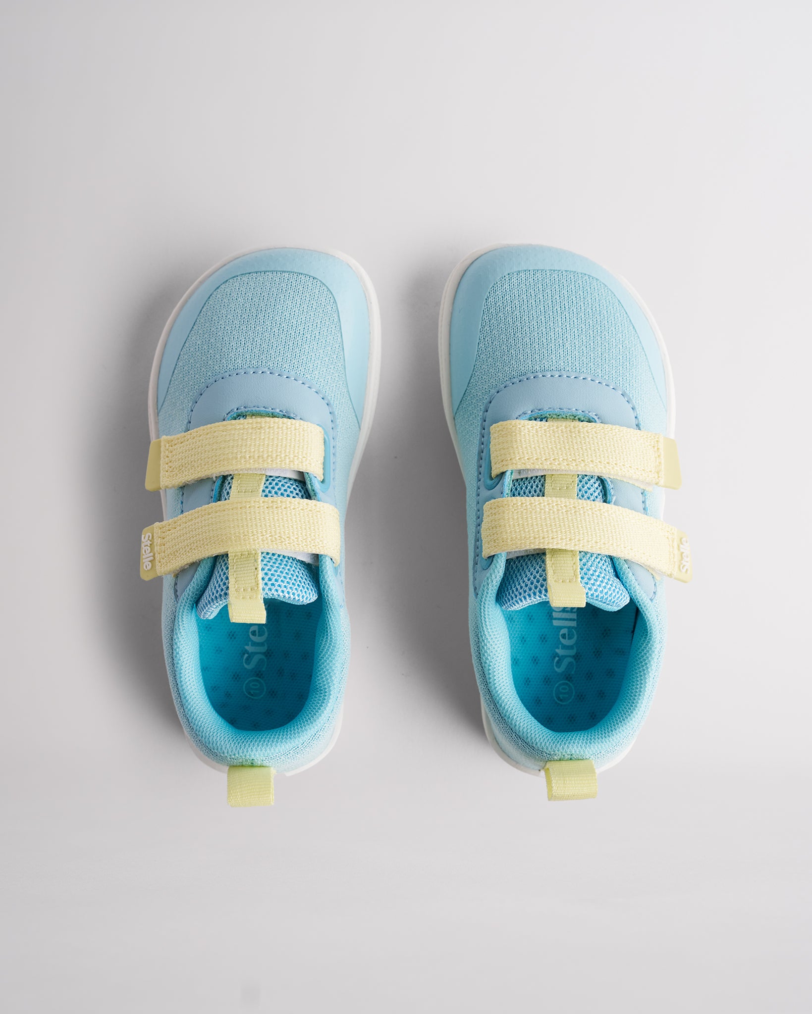 Top view of seafoam pop kids barefoot shoes showing dual straps and breathable interior