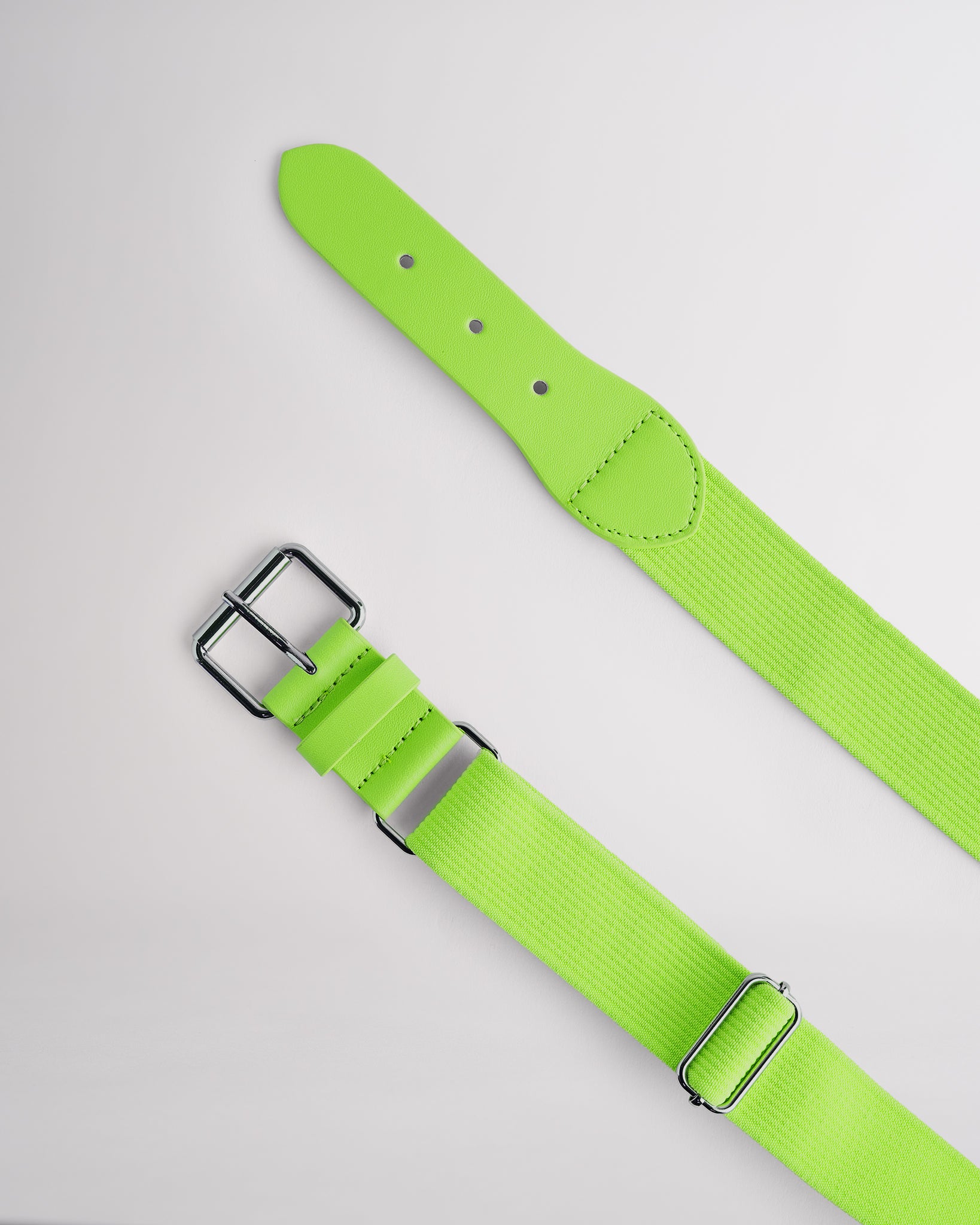 Kids neon green elastic softball belt with silver buckle.