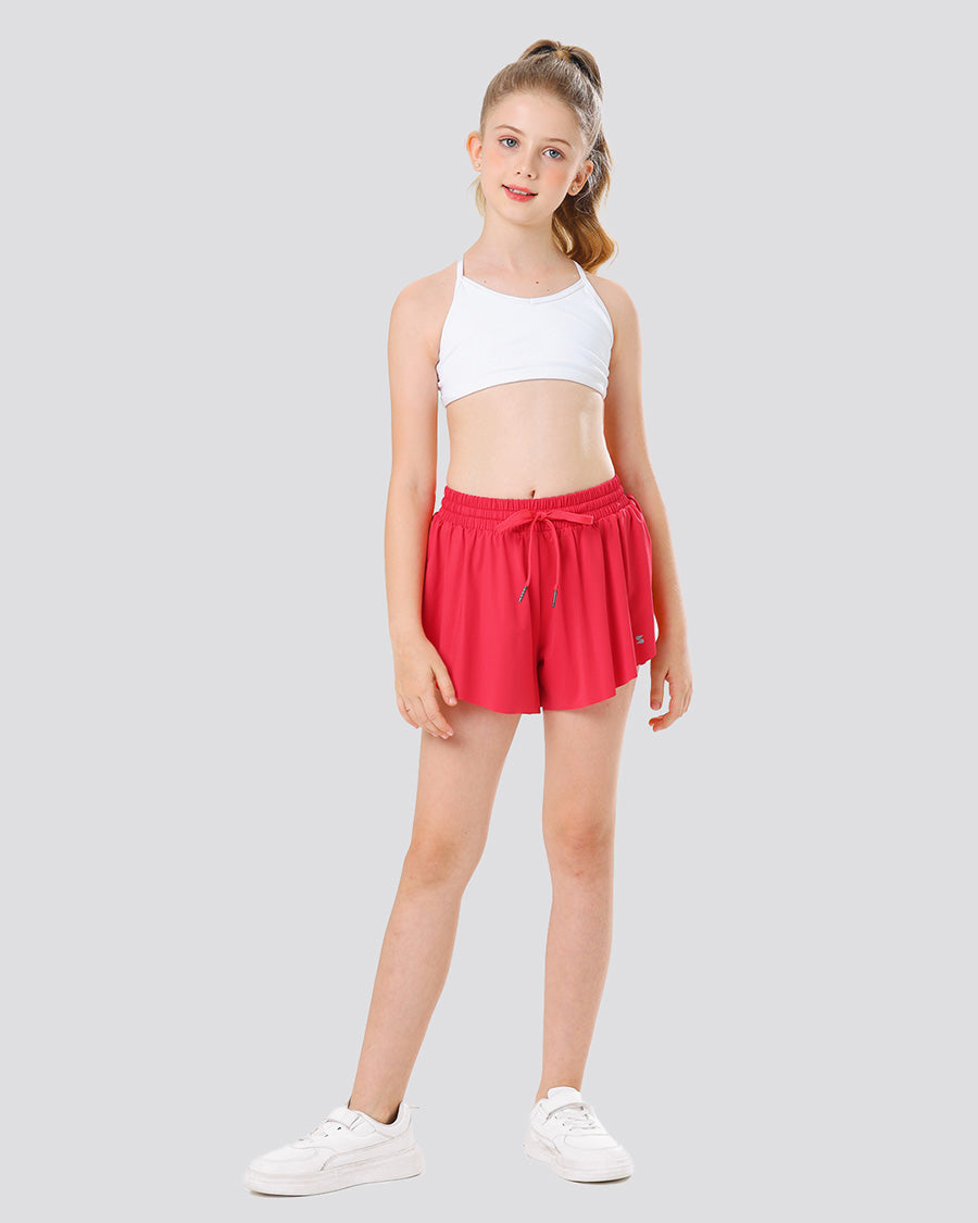 Girl wearing raspberry butterfly shorts