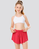 Girl wearing raspberry butterfly shorts