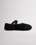Black kids stretch canvas split sole ballet shoe with elastic strap, lightweight canvas upper, and snug ballet slipper fit.