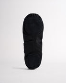 Sole view of black kids ballet shoe showing flexible suede split soles for easy movement and dance practice.