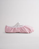 Kids glitter ballet shoes in dusty pink glitter with elastic straps, side view