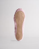 Kids dusty pink glitter ballet shoes with suede sole, bottom view