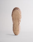 Kids gold glitter ballet shoes with suede sole, bottom view