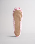 Kids pink glitter ballet shoes with suede sole, bottom view