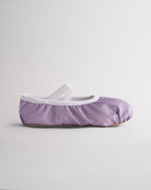 Kids glitter ballet shoes in purple glitter with elastic straps, side view