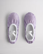 Kids glitter ballet shoes in purple glitter with crisscross elastic straps, top view