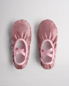 Kids glitter ballet shoes in rose glitter with crisscross elastic straps, top view