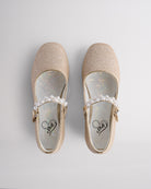 Top view of girls mary jane shoes showing pearl strap and cushioned insole