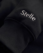 Women’s Oversized Fleece Hoodie with Embroidered Cuff in Black
