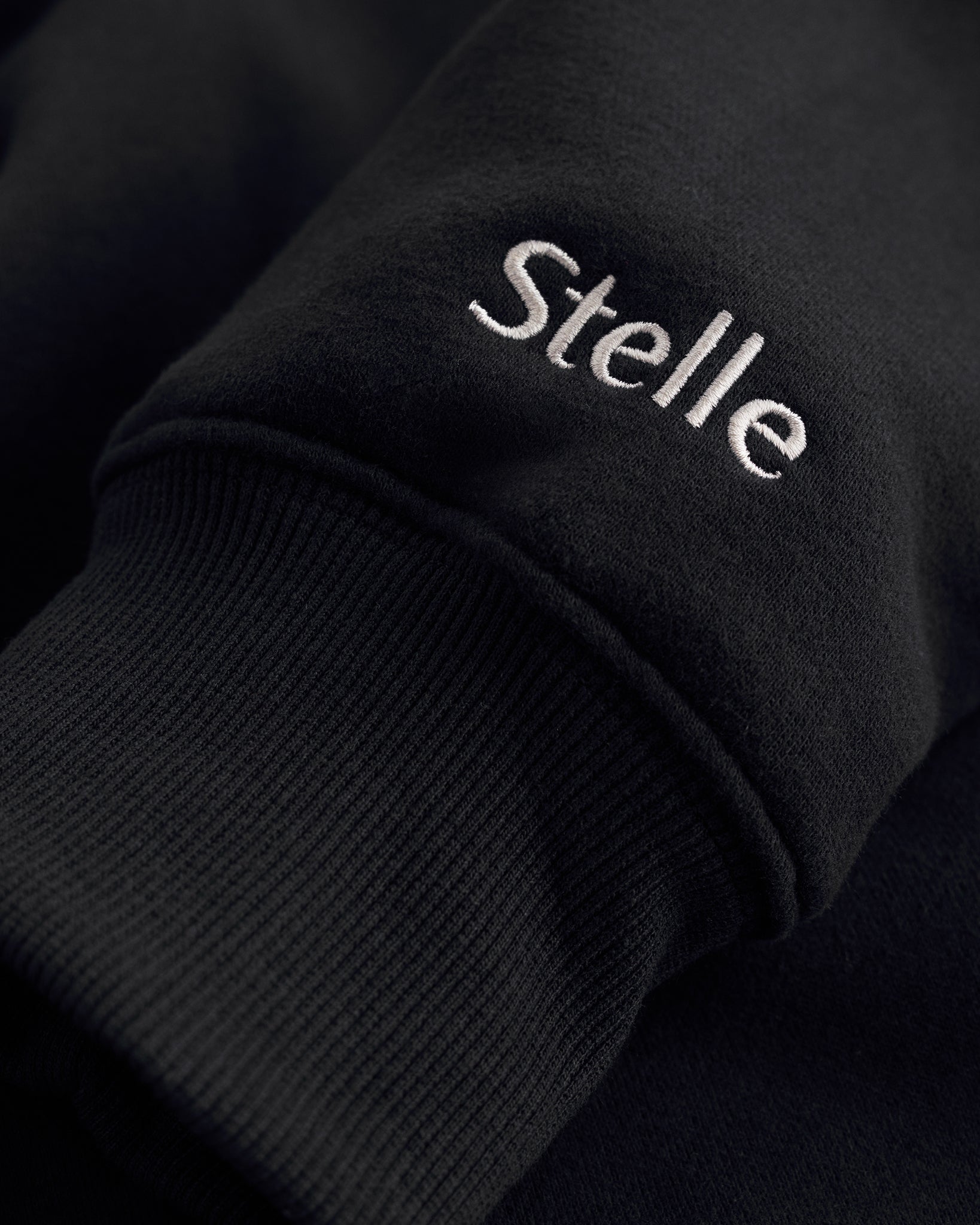 Women’s Oversized Fleece Hoodie with Embroidered Cuff in Black