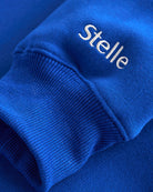 Women’s Oversized Fleece Hoodie with Embroidered Cuff in Blue