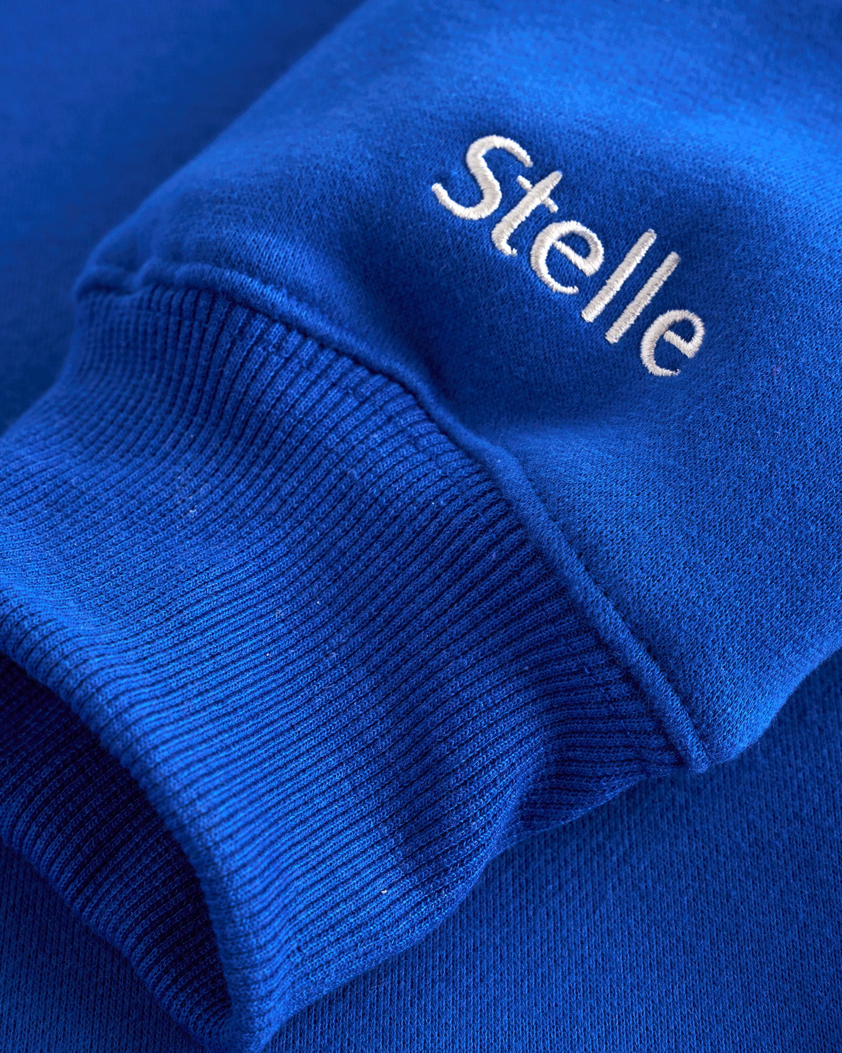 Women’s Oversized Fleece Hoodie with Embroidered Cuff in Blue