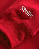 Women’s Oversized Fleece Hoodie with Embroidered Cuff in Red