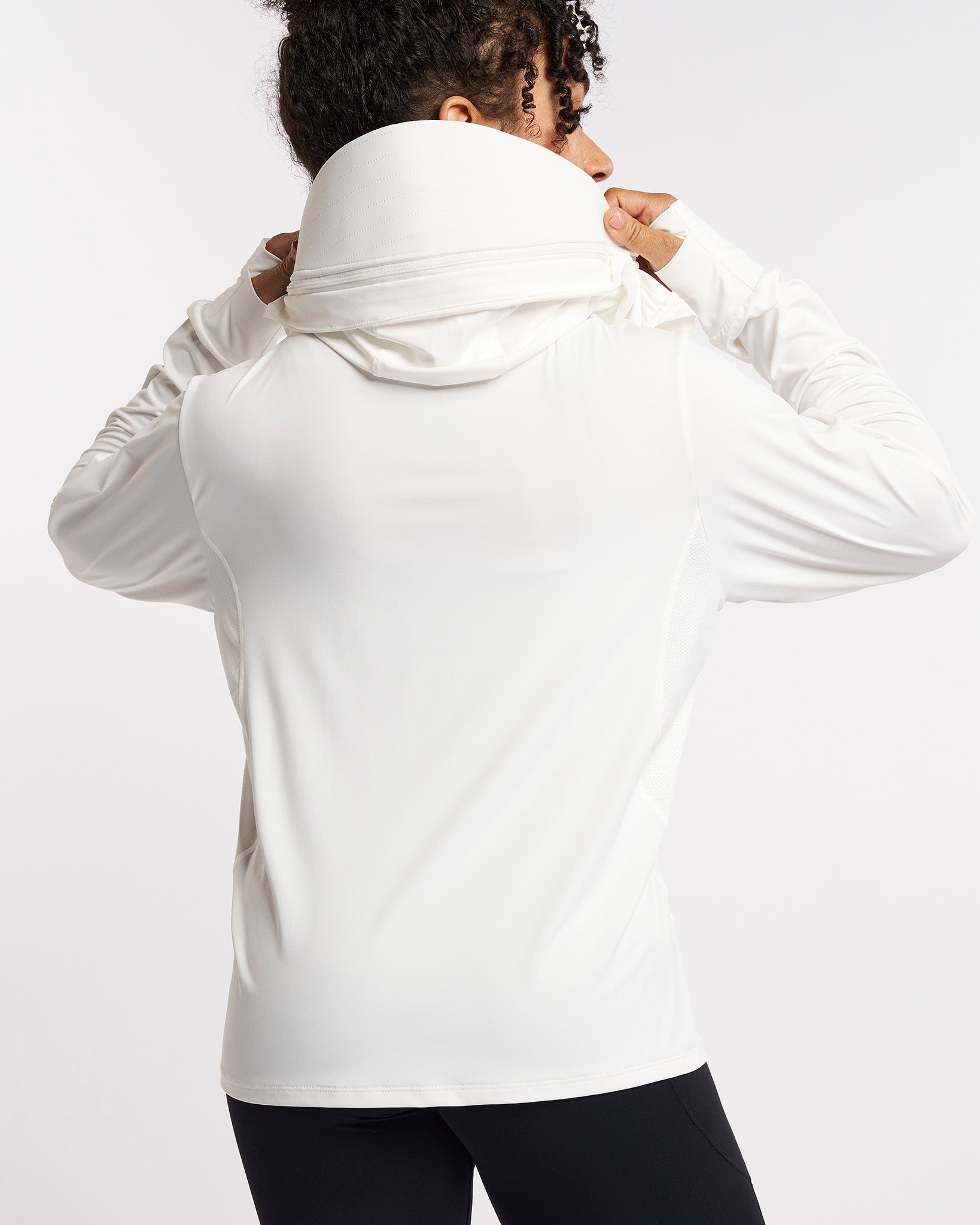 Back view of white UV-protective jacket with mesh paneling and extended sun-protection collar.
