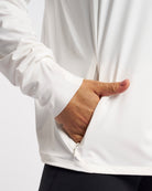 Close-up of UV-protective jacket side pocket with invisible zipper for secure storage.