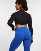 Back view of black Stelle womens long sleeve shrug showing cropped bolero design and long sleeves