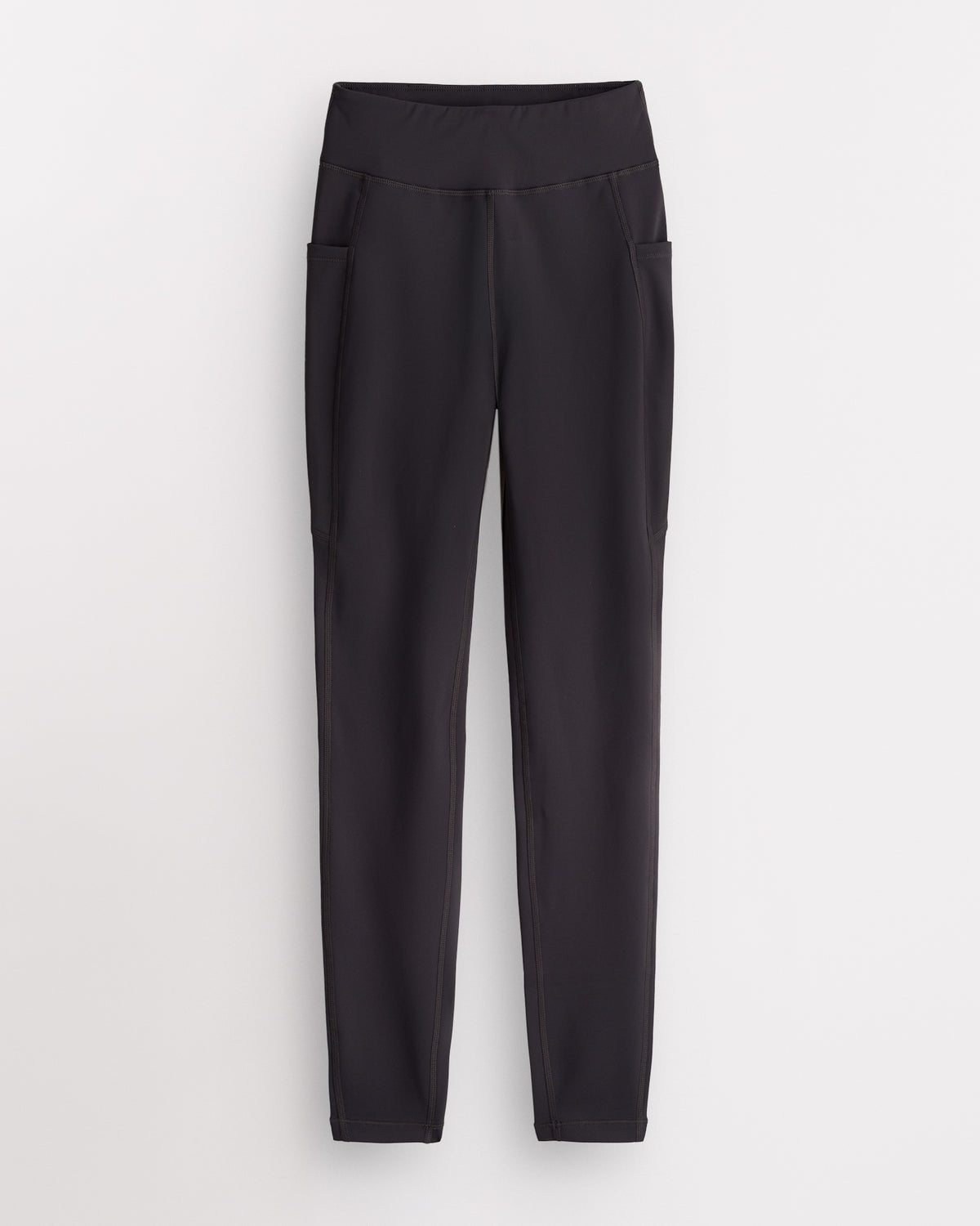 Charcoal Stelle women's fleece-lined leggings with side pockets and a high-rise waistband, laid flat.
