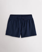 Women’s navy high-rise running shorts with a wide elastic waistband, drawstring tie, side pockets, and double-layer hem.
