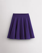 Purple Stelle womens knee-length flared midi skirt with high waistband, A-line silhouette, and flowy pleated design.