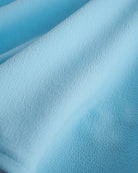 Close-up of a Baby Blue flared skater skort with built-in black shorts.