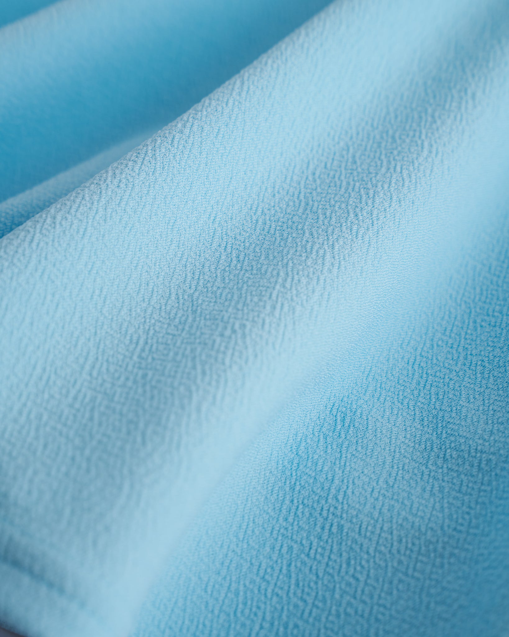 Close-up of a Baby Blue flared skater skort with built-in black shorts.