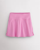 Cotton Candy Stelle classic tennis skirt with a high-waisted fit, slightly flared silhouette, side slits, and bow ribbon details.